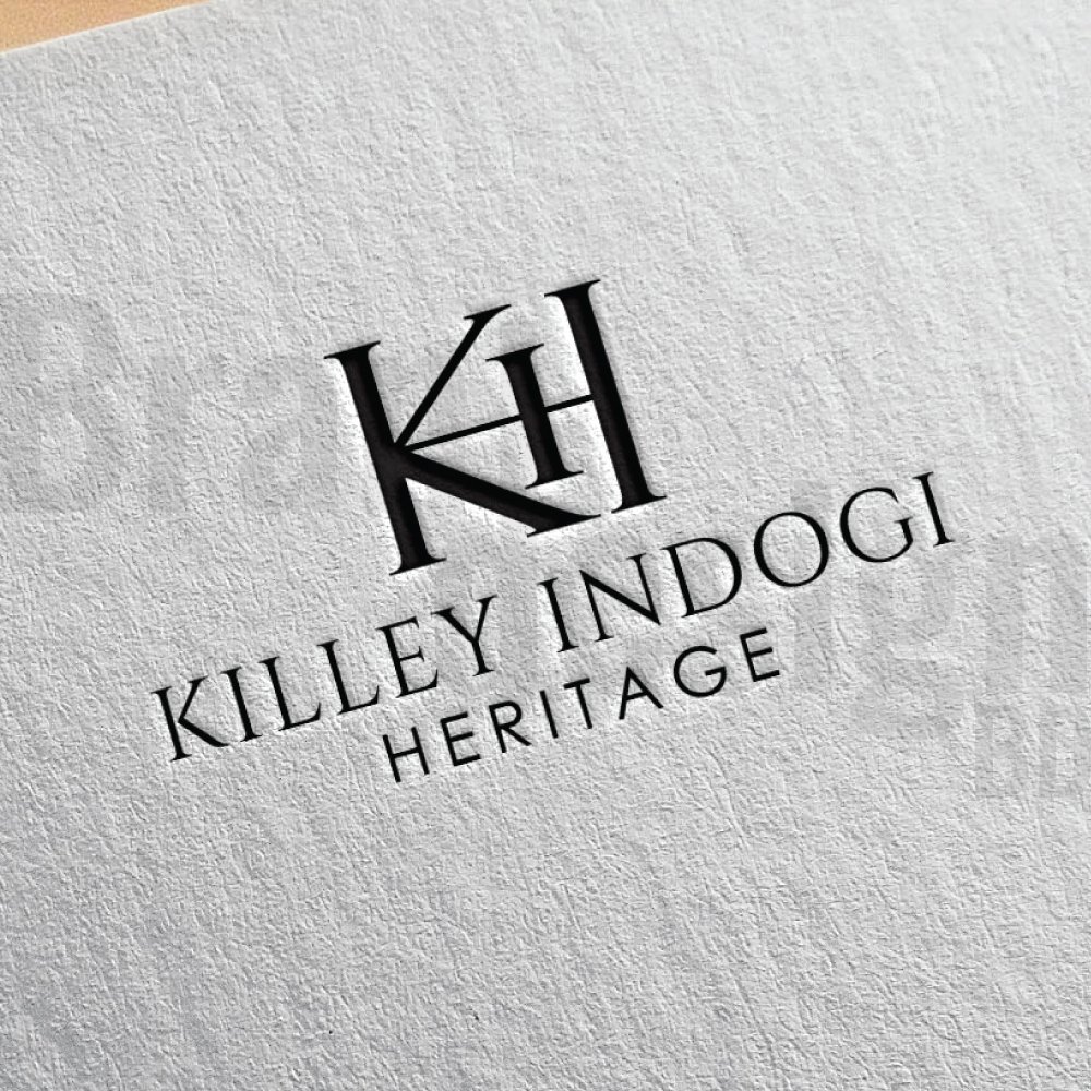 A classic and sophisticated lettermark logo for KILLEY INDOGI HERITAGE, featuring the intertwined initials K and H in a serif font, presented on a textured, light-colored paper.